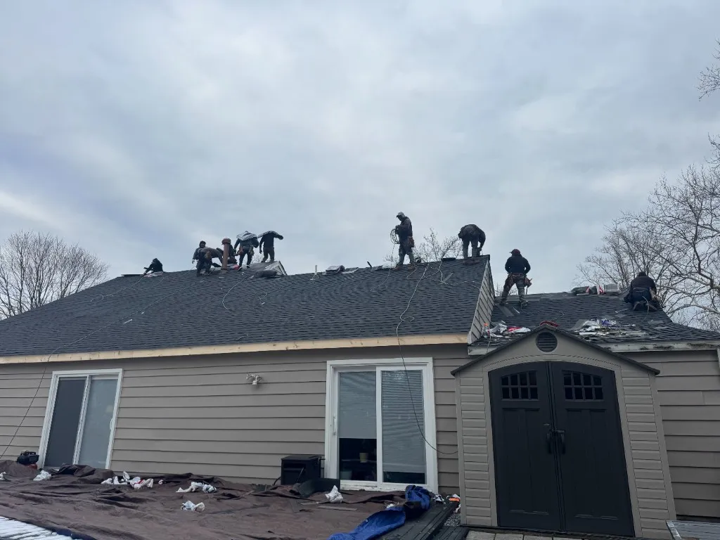 Custom shingle-sided home with new architectural roof — built by J&Hong Construction